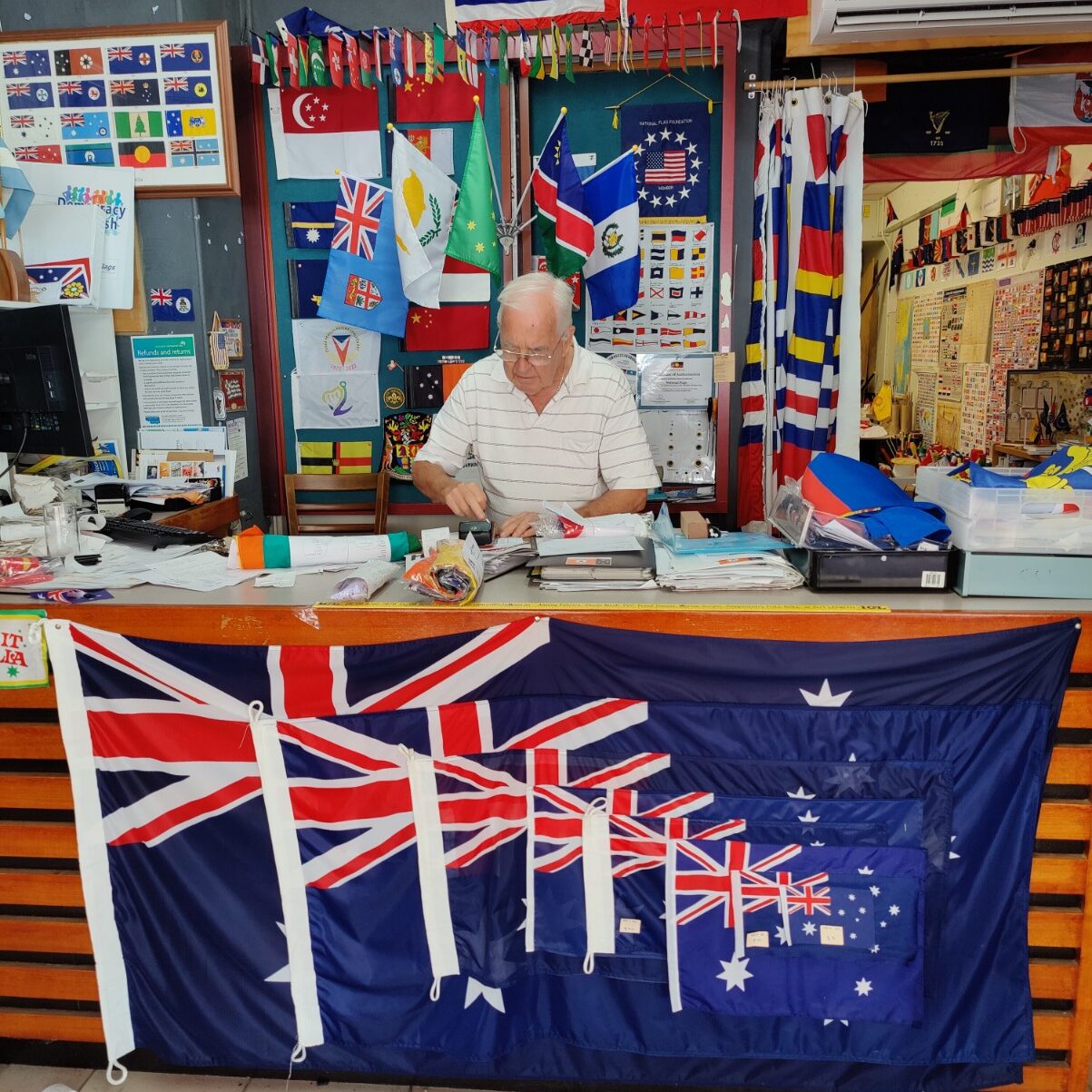 ron-from-national-flags-behind-desk