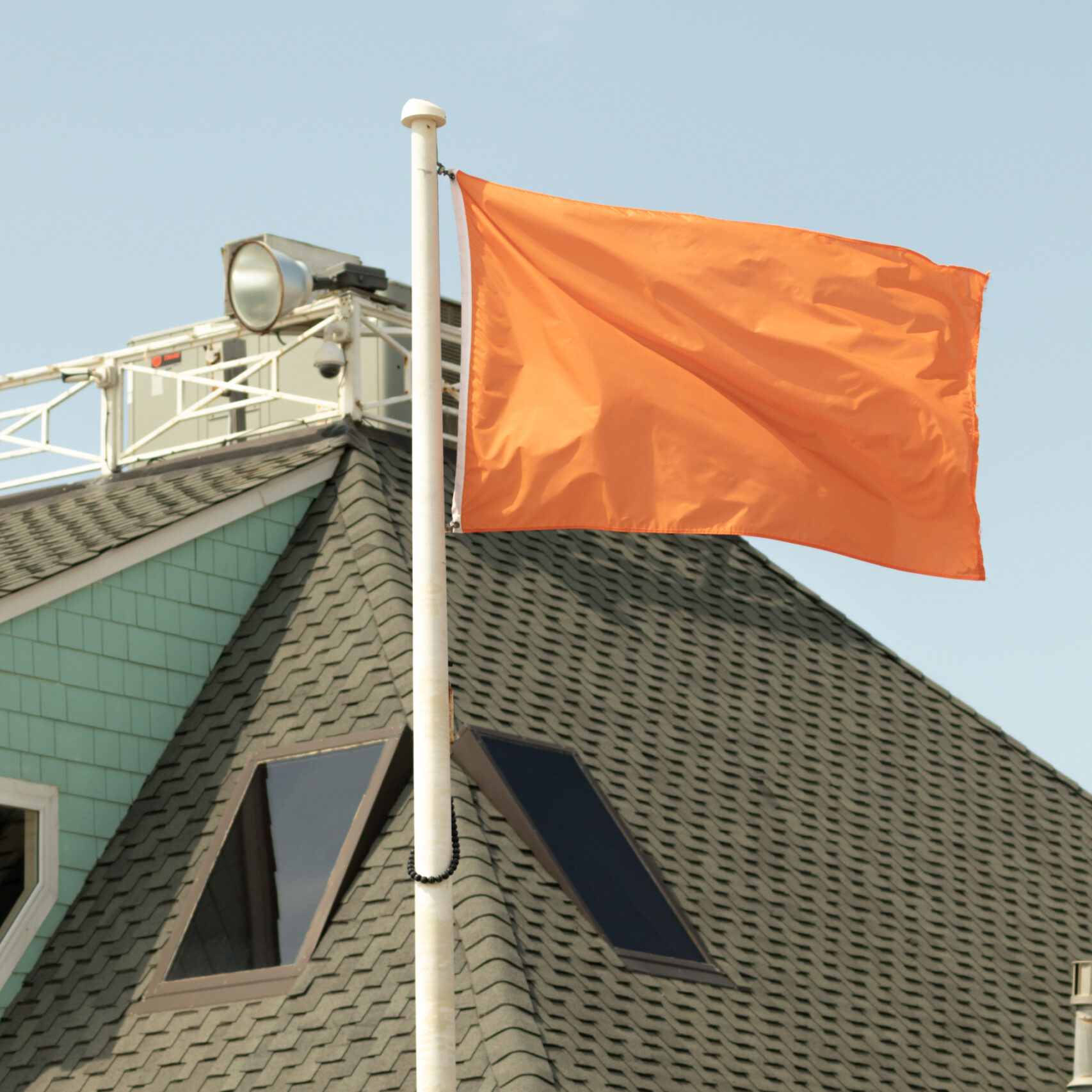 orange-flag-on-pole